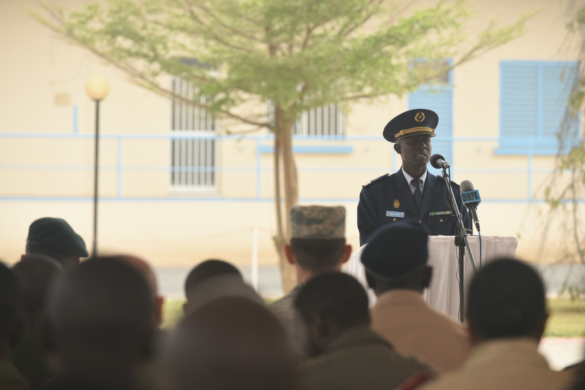Senegalese Col. Boucar Sene, second in command of the Senegalese air force, speaks during the closing ceremony of African Partnership Flight Senegal at  Captain Andalla Cissé Air Base, Senegal, March 23, 2018 The APF program is U.S. Air Forces in Africa’s premier security cooperation program with African partner nations to improve professional military aviation knowledge and skills. (U.S. Air Force photo by Airman 1st Class Eli Chevalier)