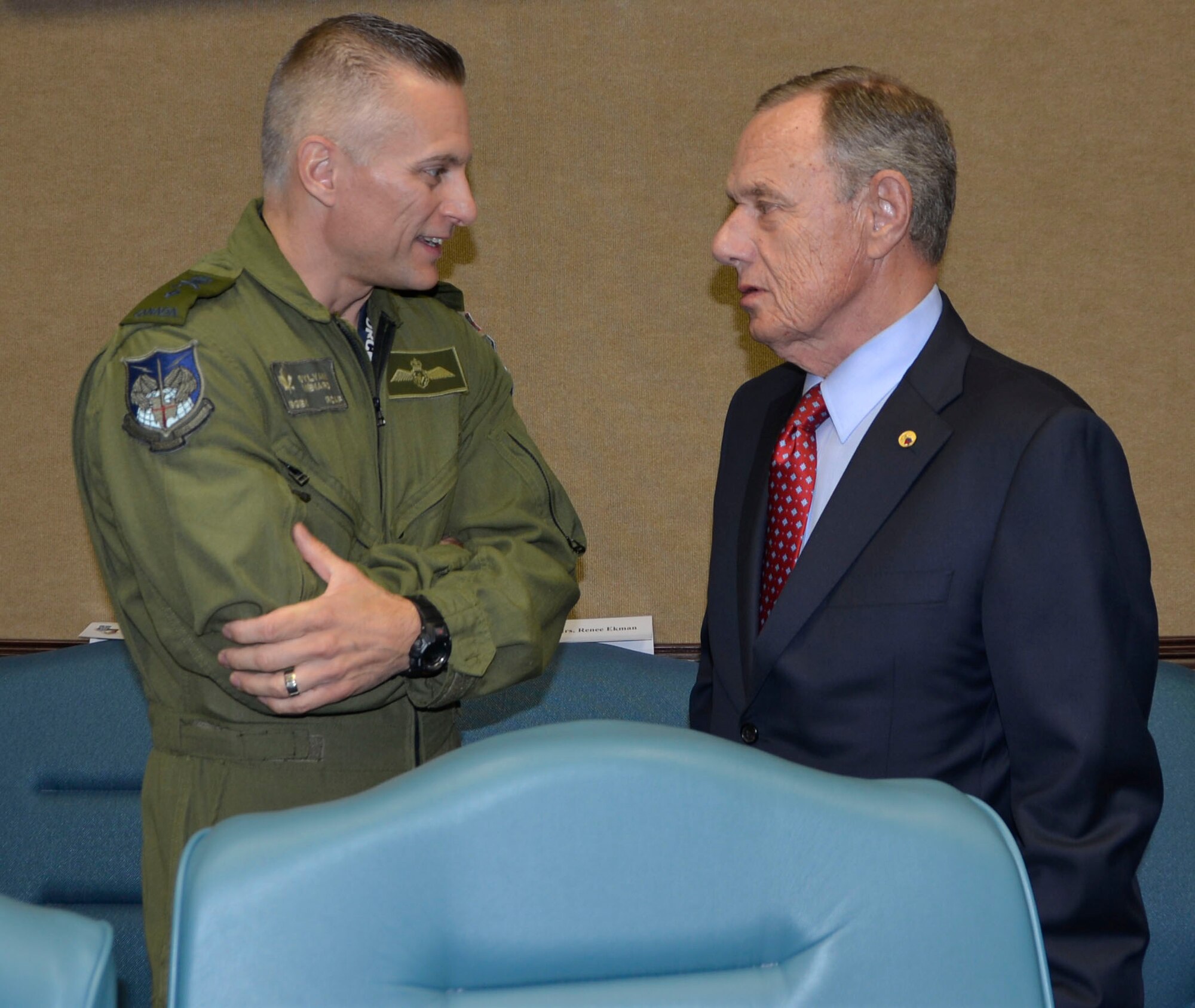 BGen Sylvain Menard, Continental U.S. NORAD Region Deputy Commander, talks with Maj. Gen. (Ret.) Philip Killey, during the “Evolution of 1st Air Force Commander’s Forum” March 14. The event, held March 13-14, brought together eight previous 1st Air Force commanders, from 1994 to the present, for a discussion on how their previous command experience lessons could enhance the success of both current and future enterprise operations.  (Air Force Photo by Mary McHale)
