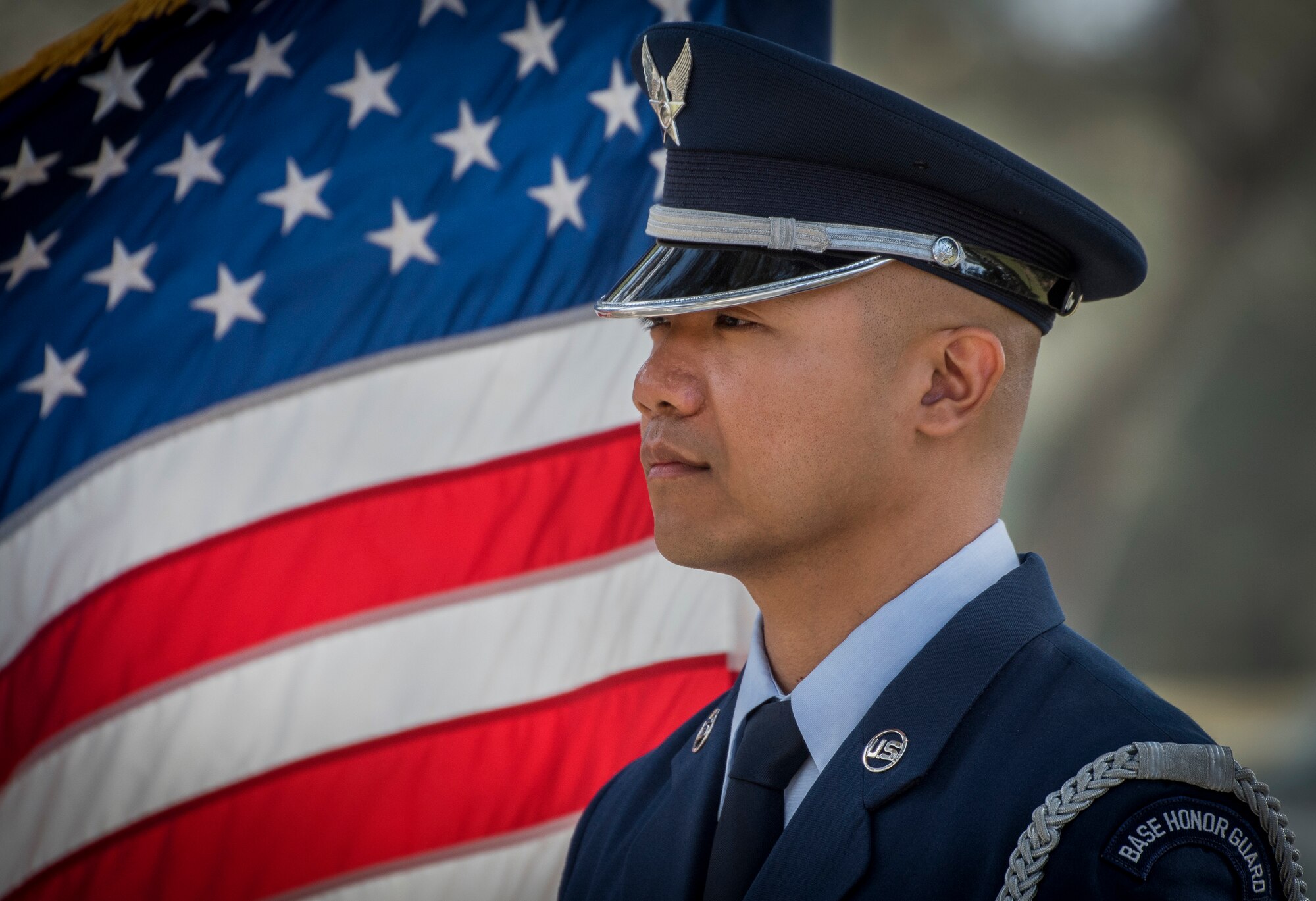Senior Airman Jarrish Toledo, 96th Inpatient Operations Squadron, stands at parade rest prior to the honor guard graduation ceremony March 1, 2018, at Eglin Air Force Base, Fla. Approximately 13 new Airmen graduated from the 120-plus-hour course. The graduation performance includes flag detail, rifle volley, pall bearers and bugler for friends, family and unit commanders. (U.S. Air Force photo by Samuel King Jr.)