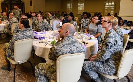 Guests attending a Women’s History Month luncheon held in the Charleston Club listen to a speech March 20, 2018, at Joint Base Charleston, S.C.
