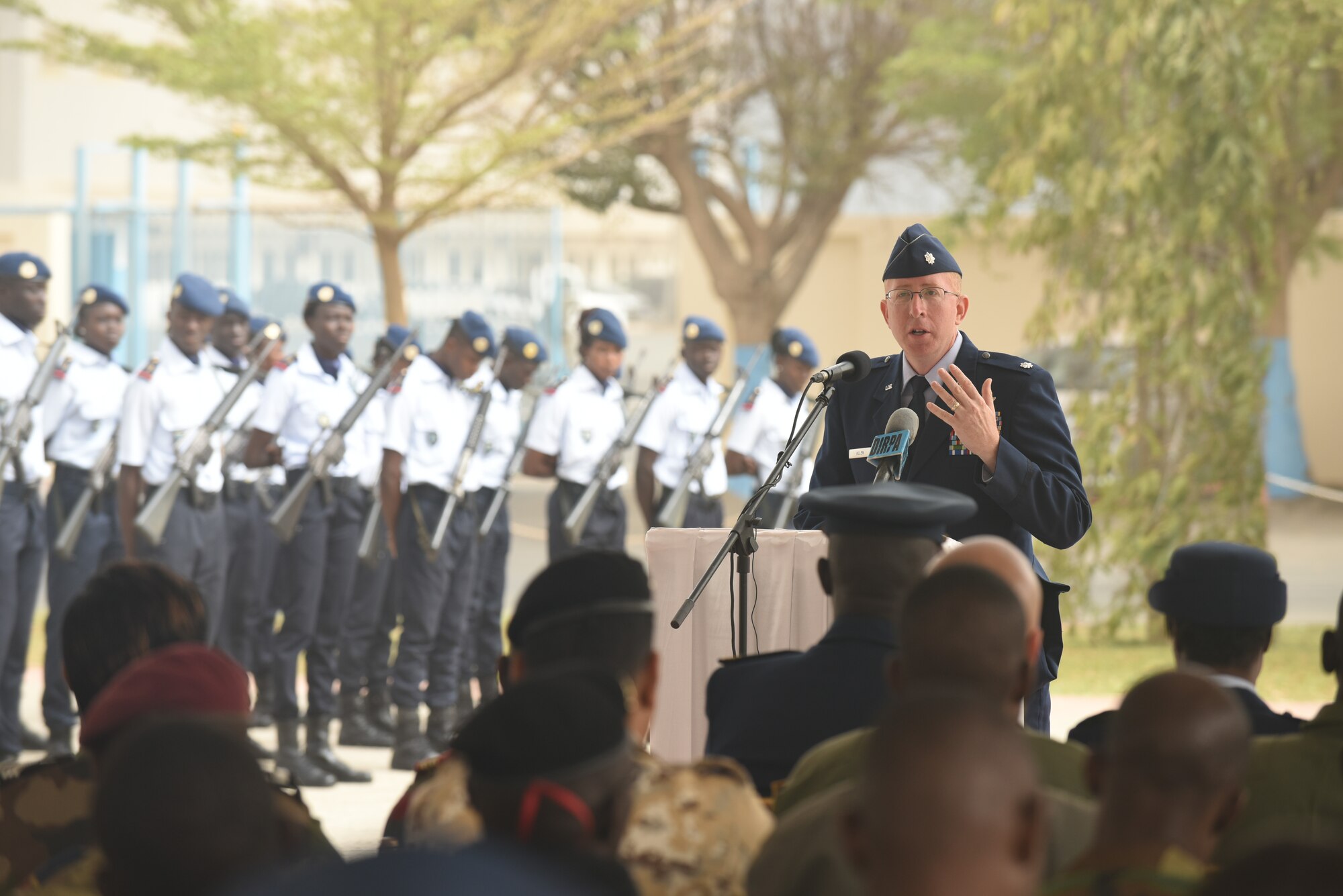 U.S. Air Force Lt. Col. Andrew Allen, chief of global health engagements branch, U.S. Air Forces in Europe and Air Forces Africa, speaks during the closing ceremony of African Partnership Flight Senegal at Captain Andalla Cissé Air Base, Senegal, March 23, 2018. The purpose of APF Senegal is to conduct multilateral, military-to-military engagements and security assistance with African air forces. (U.S. Air Force photo by Airman 1st Class Eli Chevalier)