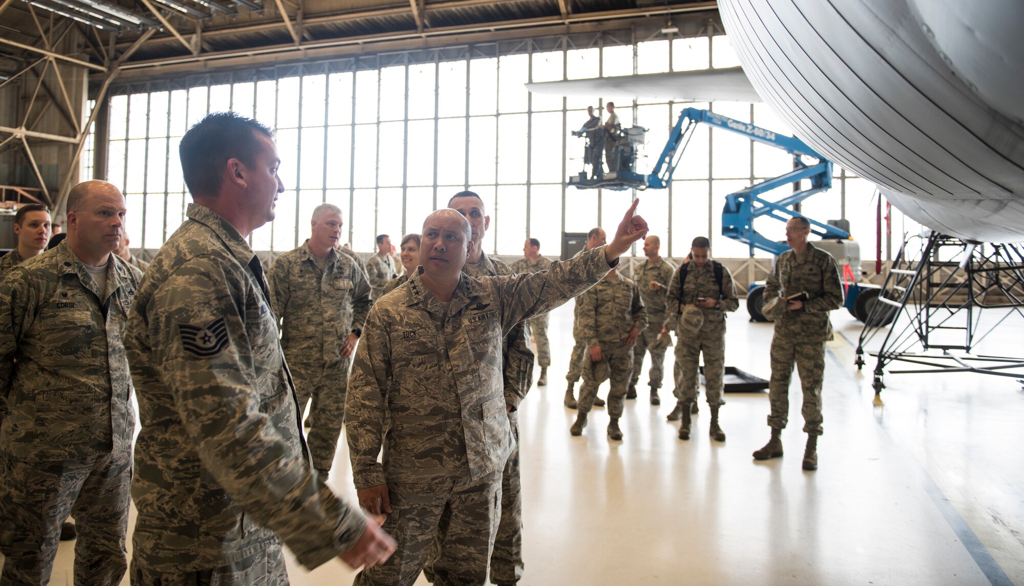 Lt. Gen. GI Tuck, 18th Air Force commander, and Chief Master Sgt. Todd Petzel, 18th AF command chief, are shown an isochronal inspection during a mission immersion March 20, 2018, at Fairchild Air Force Base, Washington. The tour familiarized 18th AF leadership with the Fairchild mission and the Airmen who make it happen. (U.S. Air Force photo/Senior Airman Sean Campbell)