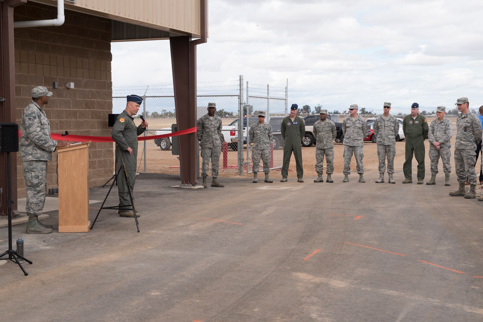 Brig. Gen. Brook Leonard, 56th Fighter Wing commander, addresses the audience during the ribbon-cutting ceremony for the 56th Logistics Readiness Squadron Fuels Management Flight’s new pump house at Luke Air Force Base, Ariz., March 15, 2018. The fuel pump house will improve safety by reducing the amount of time fuel operators spend driving on base roads. (U.S. Air Force photo by Senior Airman Ridge Shan)