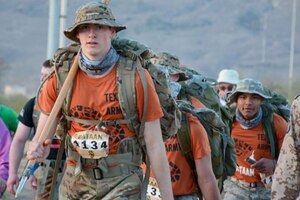 ROTC cadets walk together during the Bataan Memorial Death March. .