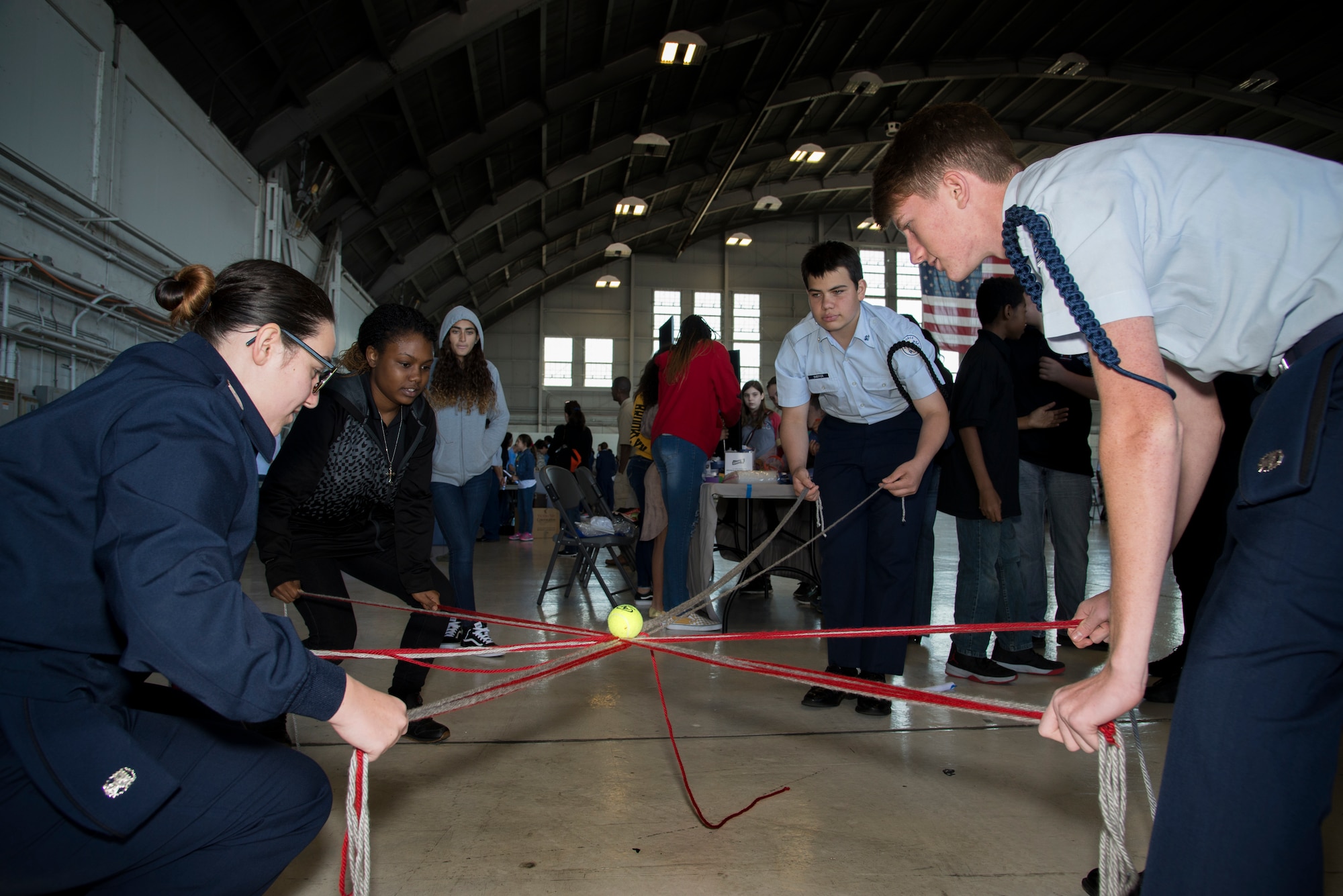 Florida Junior Reserve Officer Training Corps (JROTC) cadets participate in a team building exercise during the Science, Technology, Engineering, Arts and Math (STEAM) Day at MacDill Air Force Base, Fla., March 21, 2018.