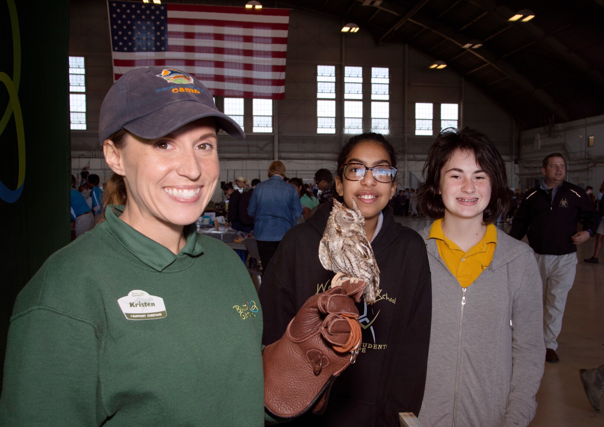 Kristen Gefre, a Busch Gardens education instructor, pauses for a photo with students during the Science, Technology, Engineering, Arts and Math (STEAM) Day at MacDill Air Force Base, Fla., March 21, 2018.