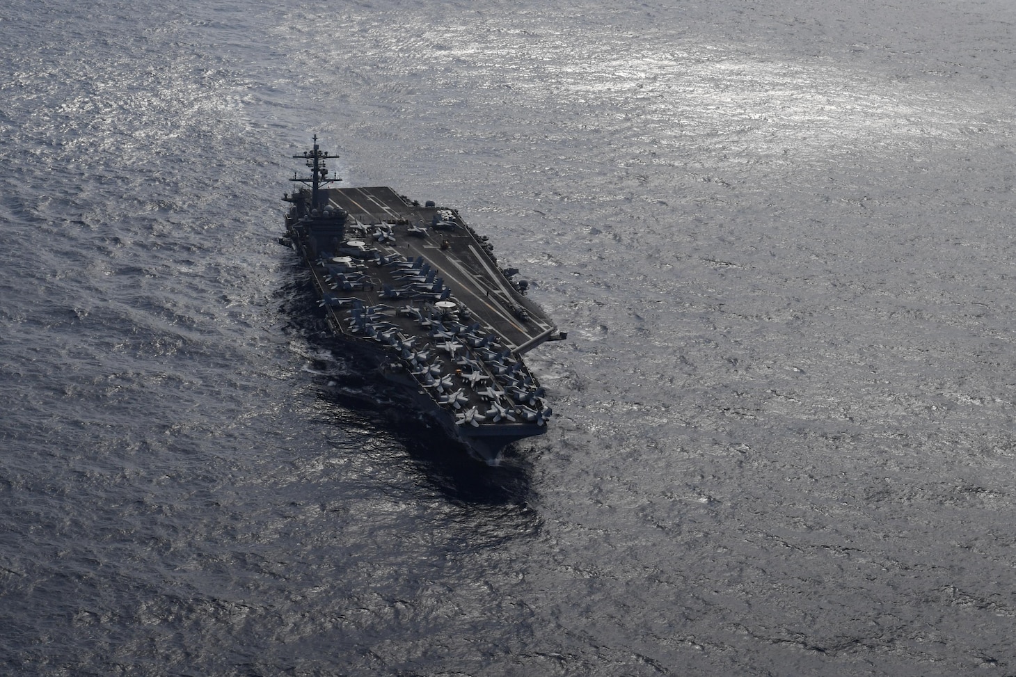 File photo: PACIFIC OCEAN (Nov. 9, 2017) The aircraft carrier USS Theodore Roosevelt (CVN 71) transits the Pacific Ocean. Theodore Roosevelt is underway for a regularly scheduled deployment to the U.S. 7th Fleet area of operations in support of maritime security operations and theater security cooperation efforts.