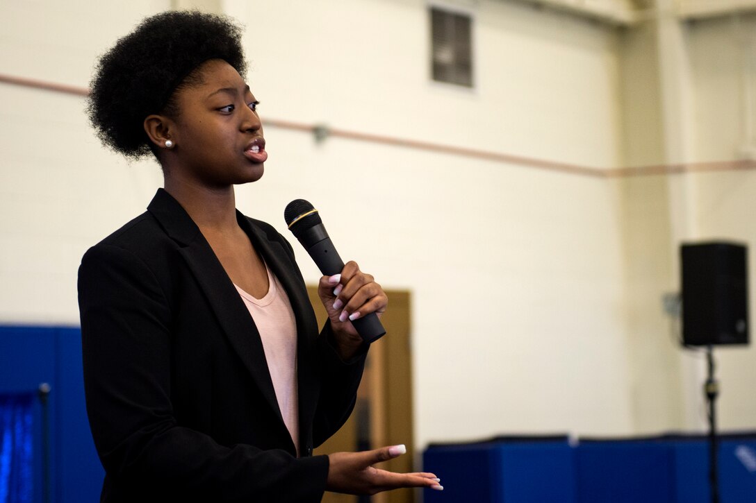 Nevaeh Wallace, daughter of Master Sgt. Marvin Wallace, 723d Aircraft Maintenance Squadron first sergeant, and Master Sgt. Yolanda Wallace, 23d Wing chapel assistant, recites her speech during the Youth of the Year Finalist Celebration, March 23, 2018, at Moody Air Force Base, Ga. The Youth Center hosted the event to give parents and community members a chance to see the competitors give their speeches they presented during the Georgia State Youth of the Year Competition. This was the first time two competitors from southeast region made it to the semifinals at the same time. (U.S. Air Force photo by Airman 1st Class Erick Requadt)