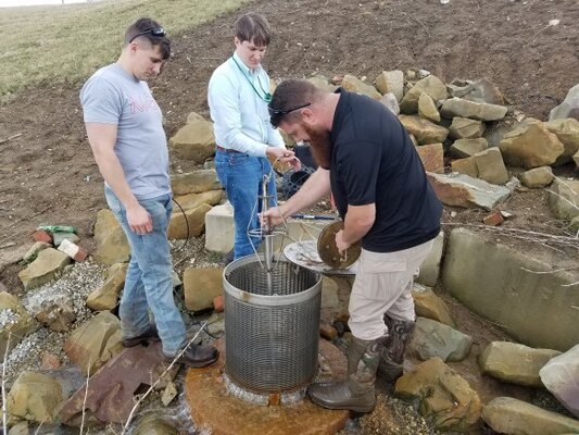 Measuring flow in a relief well as part of the Portsmouth-New Boston, Ohio local protection project during a recent high water event.