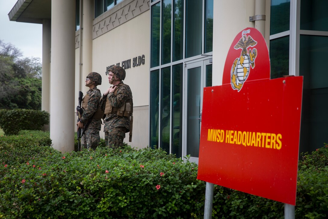 U.S. Marines with Marine Aircraft Group (MAG) 24 provide security for a base defense exercise aboard Marine Corps Air Station Kaneohe Bay, Mar. 14, 2018. Marine Corps Base Hawaii (MCBH) simultaneously conducted a base defense exercise, producing readiness for VMU-3, Marine Aircraft Group 24, MCAS Kaneohe Bay and MCBH. (U.S. Marine Corps photo by Sgt. Alex Kouns)