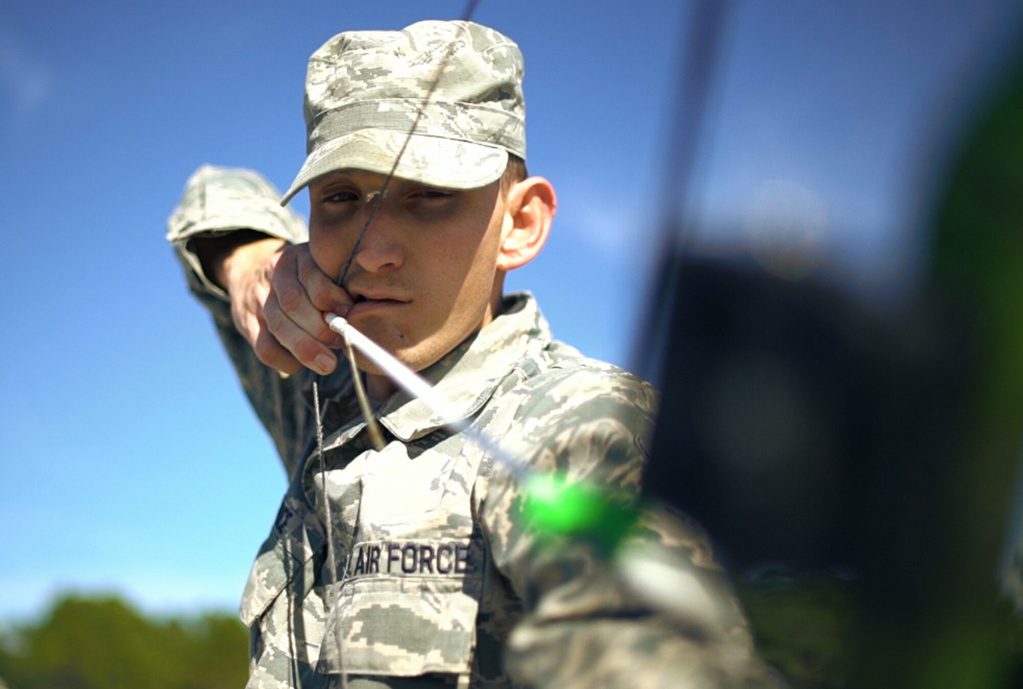 Bow fisherman takes aim.