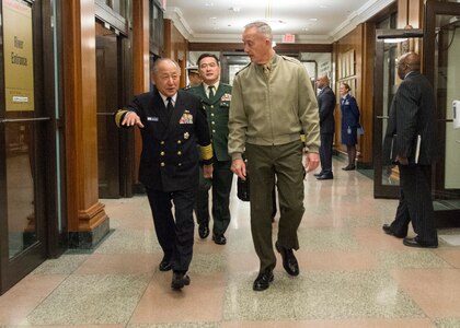 Gen. Joe Dunford, chairman of the Joint Chiefs of Staff, meets with his Japanese counterpart, Adm. Katsutoshi Kawano, at the Pentagon, March 26, 2018.