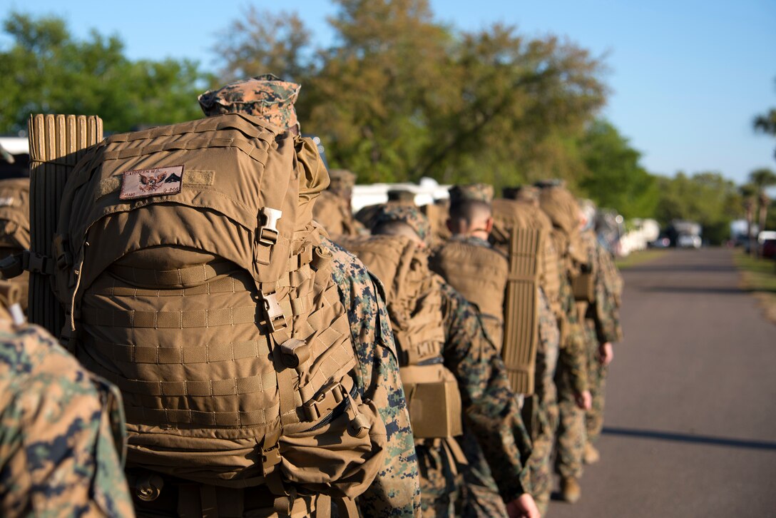 U.S. Marines ruck during a U.S. Marine Corps Forces Central Command ...