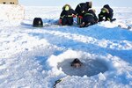 Ice Camp Skate (March 16, 2018) – Chief Hospital Corpsman Kristopher Mandaro, assigned to Underwater Construction Team One (UCT 1), surfaces from a waterhole during a torpedo exercise in the Arctic Circle in support of Ice Exercise (ICEX) 2018, March 16. ICEX 2018 is a five-week exercise that allows the Navy to assess its operational readiness in the Arctic, increase experience in the region, advance understanding of the Arctic environment, and continue to develop relationships with other services, allies and partner organizations. (U.S. Navy photo by Mass Communication Specialist 1st Class Daniel Hinton)