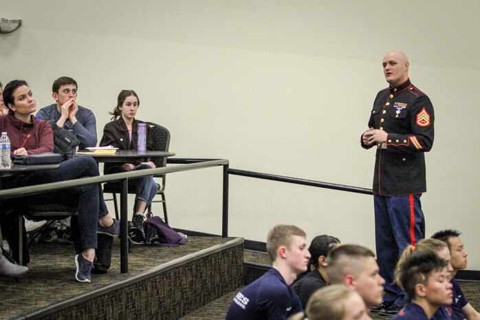 Staff Sgt. Shawn Dundee, staff noncommissioned officer-in-charge, Recruiting Substation Des Moines, speaks to parents of those who recently enlisted in the Marine Corps during the station’s annual Drill Instructor Family Night at Events Center West in West Des Moines, Iowa, March 23, 2018. Marine Corps Recruiting Command hosts the family nights to better prepare both parent and enlistee prior to attending Marine Corps Recruit Training. (Official U.S. Marine Corps photo by Sgt. Levi Schultz)