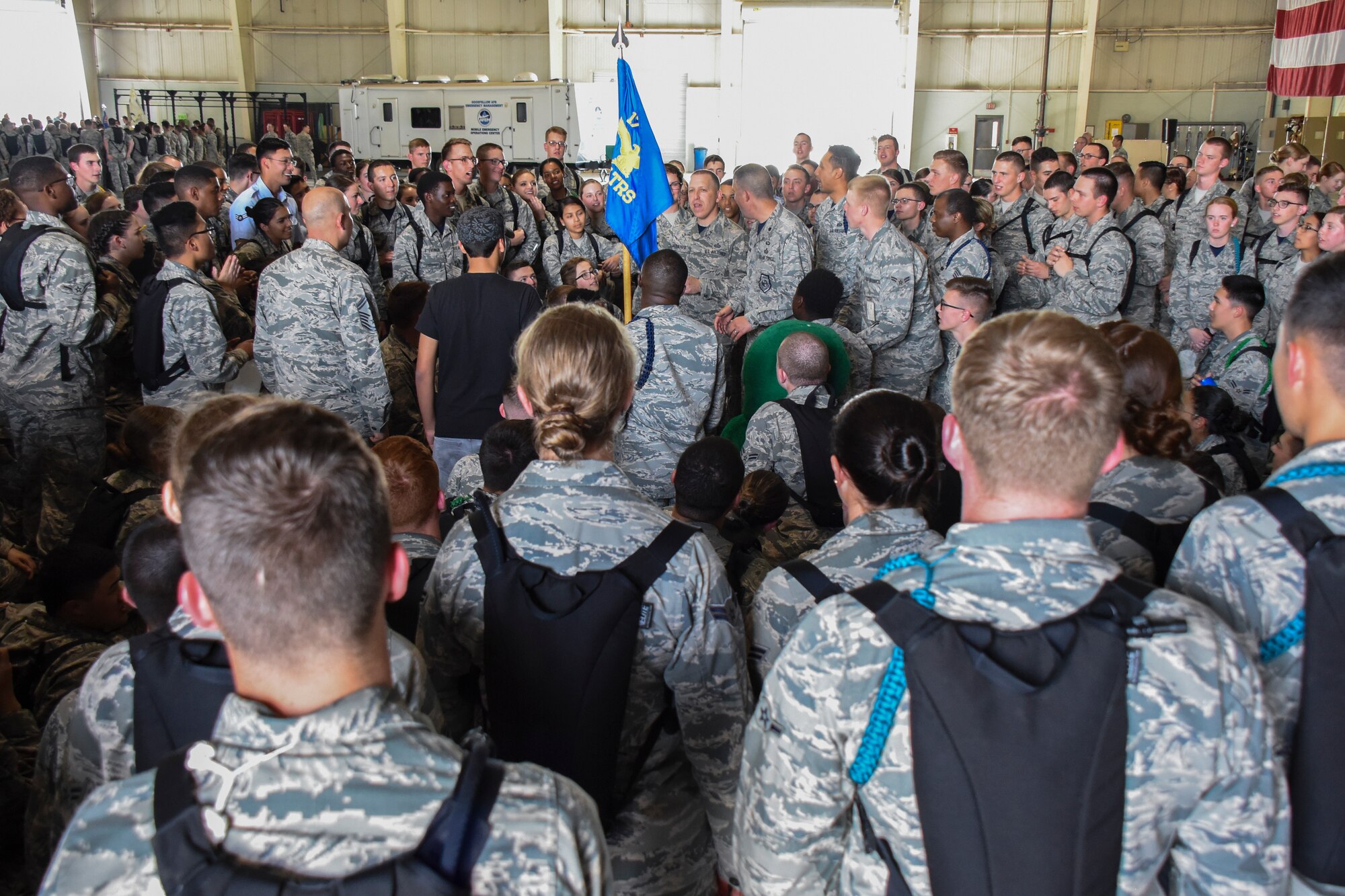 U.S. Air Force Chief Master Sgt. Jason Funkhauser, 315th Training Squadron chief enlisted manager, speaks to trainees after the quarterly drill competition at the Louis F. Garland Department of Defense Fire Academy on Goodfellow Air Force Base, Texas, March 23, 2018. Leadership, including squadron commanders, came out to celebrate and cheer for their squadrons. (U.S. Air Force photo by Airman 1st Class Zachary Chapman/Released)