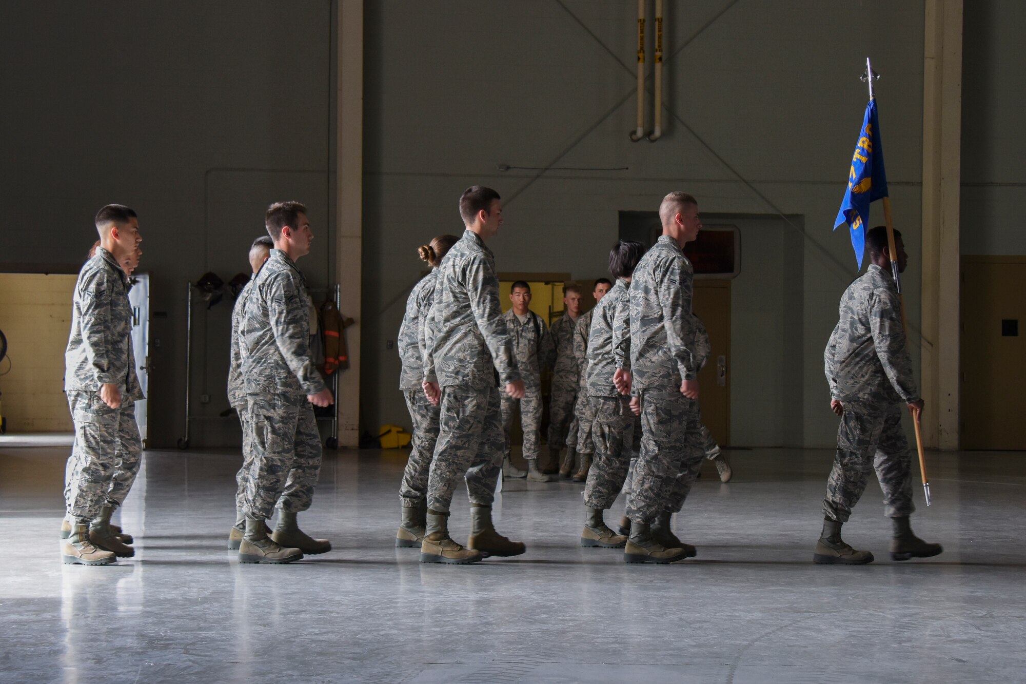 The 316th Training Squadron begins their march out to the regulation drill competition during the annual drill competition at the Louis F. Garland Department of Defense Fire Academy on Goodfellow Air Force Base, Texas, March 23, 2018. While there was a joint group consisting of trainees from the 316th TRS, 315th Training Squadron and the 312th Training Squadron competing for the exhibition drill, each squadron could compete against each other during the regulation drill portion of the event. (U.S. Air Force photo by Airman 1st Class Zachary Chapman/Released)