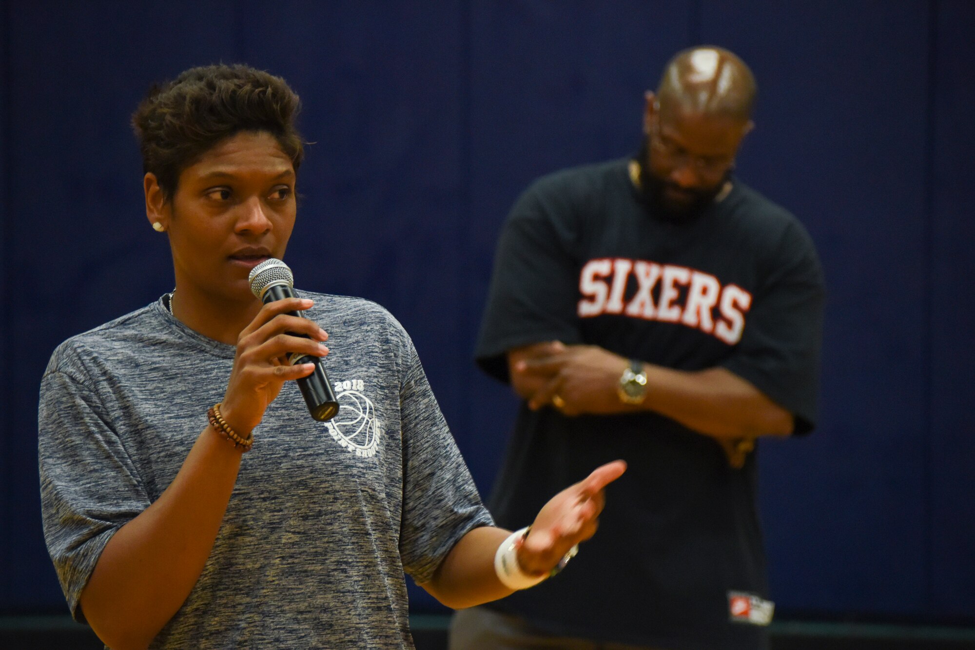 2017 NCAA Women’s Final Four Ambassador, Alicia Thompson speaks during the 3-on-3 tournament at the Mathis Fitness Center on Goodfellow Air Force Base, Texas, March 24, 2018. Thompson spoke on the importance of resiliency and spoke on what helped her come back from being told she would never be able to play basketball after tearing four ligaments in her knee. (U.S. Air Force photo by Airman 1st Class Zachary Chapman/Released)