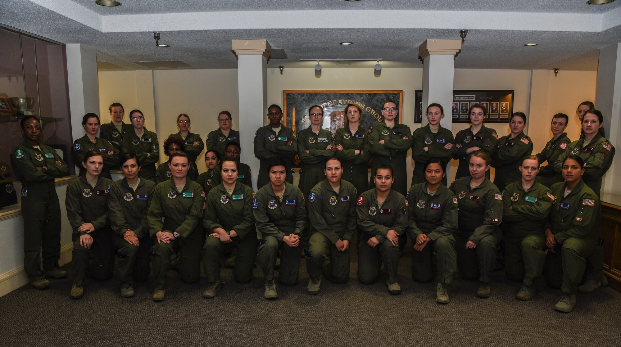 The all-female alert crew prepares to trip out to the missile field for the third year at F.E. Warren Air Force Base, Missile Complex, March 25, 2018. For 24 hours across 20th Air Force, women held the key to air power by having all-female missile alert crews for the third year at all facilities. The purpose of the all-female alert was to recognize female history and to honor the first female to pull alert on the Minuteman III ICBM. (U.S. Air Force photo by Airman 1st Class Abbigayle Wagner)