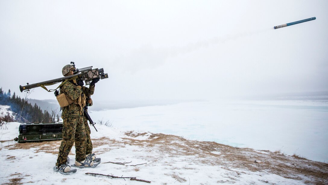 A Marine fires a stinger training launch simulator.