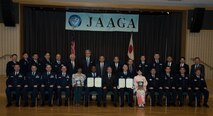 A group of attendees with the Japan-American Air Force Goodwill Association poses for a photo at Misawa Air Base, Japan, March, 20, 2018. The JAAGA honors individuals who greatly contribute to improving the friendship and bond between U.S. Air Force and Japan Air Self-Defense Force members. (U.S. Air Force photo by Airman 1st Class Collette Brooks)