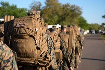 U.S. Marines ruck during a U.S. Marine Corps Forces Central Command noncommissioned officer (NCO) field exercise at MacDill Air Force Base, Fla., March 14-15, 2018. The exercise consisted of classes and practical applications focused on developing skills as an NCO.
