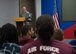 U.S. Air Force Airman Jeremy Wentworth, a photojournalist assigned to the 97th Air Mobility Wing Public Affairs, briefs about the history of Altus Air Force Base to Air Force Junior ROTC cadets from Timberview High School, Texas, March 23, 2018, at Altus AFB, Okla. The Junior ROTC is a program sponsored by the United States Armed Forces in high schools and middle schools across the country, which helps develop students interested in joining the military.  (U.S. Air Force photo by Senior Airman Kirby Turbak)