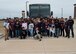Air Force Junior ROTC cadets from Timberview High School, Texas, take a group photo after getting a tour of the base, March 23, 2018, at Altus Air Force Base, Okla. The Junior ROTC is a program sponsored by the United States Armed Forces in high schools and middle schools across the country which helps develop students interested in joining the military.  (U.S. Air Force photo by Senior Airman Kirby Turbak)