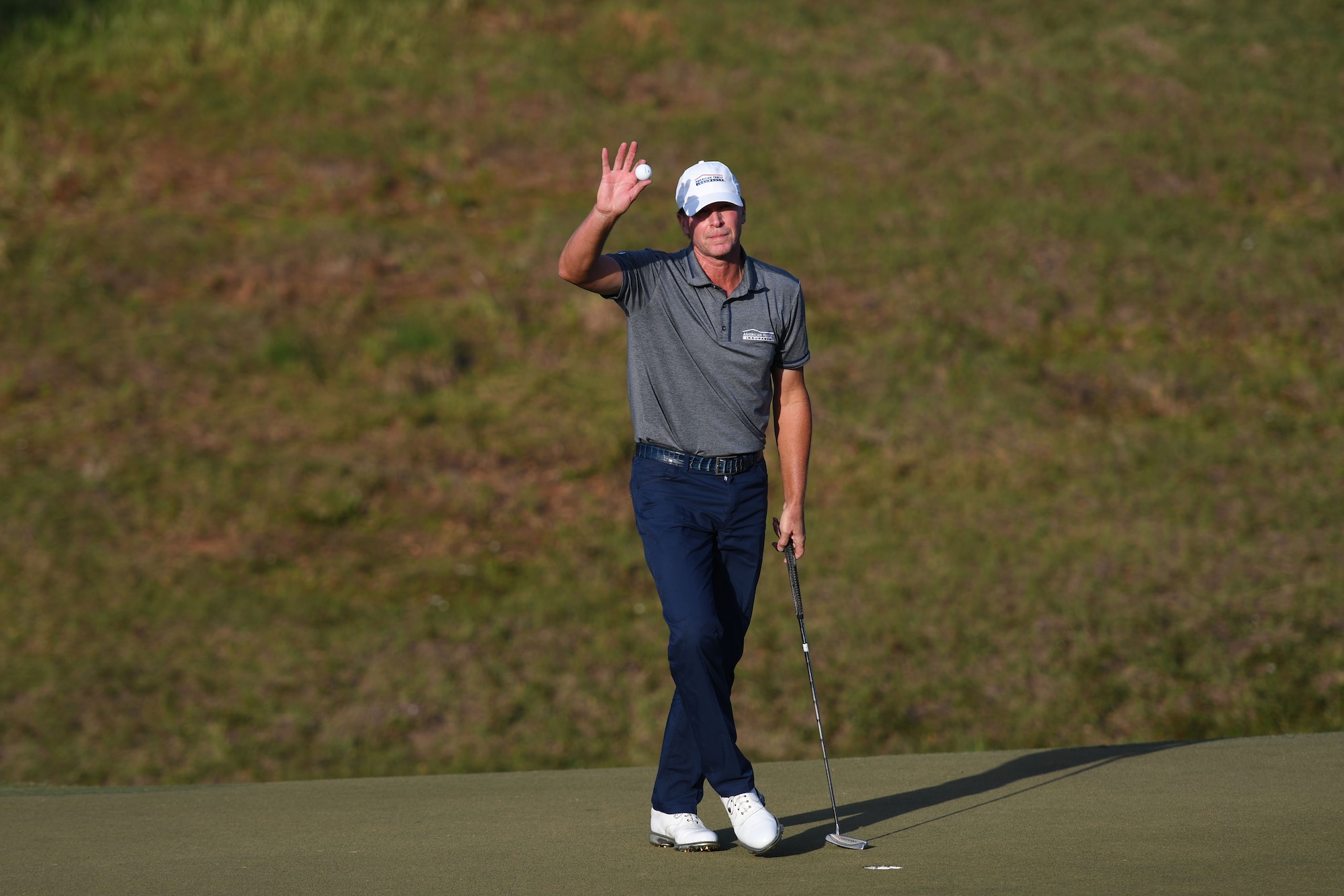 Steve Stricker, Professional Golfers’ Association golfer, waves to the crowd after winning the Rapiscan Systems Classic Champions Tour at Fallen Oak Golf Club March 25, 2018, in Saucier, Mississippi. Keesler personnel performed the national anthem and presented the colors during the closing ceremony of the three-day event. This is the fifth year that the event has been held on the coast. (U.S. Air Force photo by Kemberly Groue)