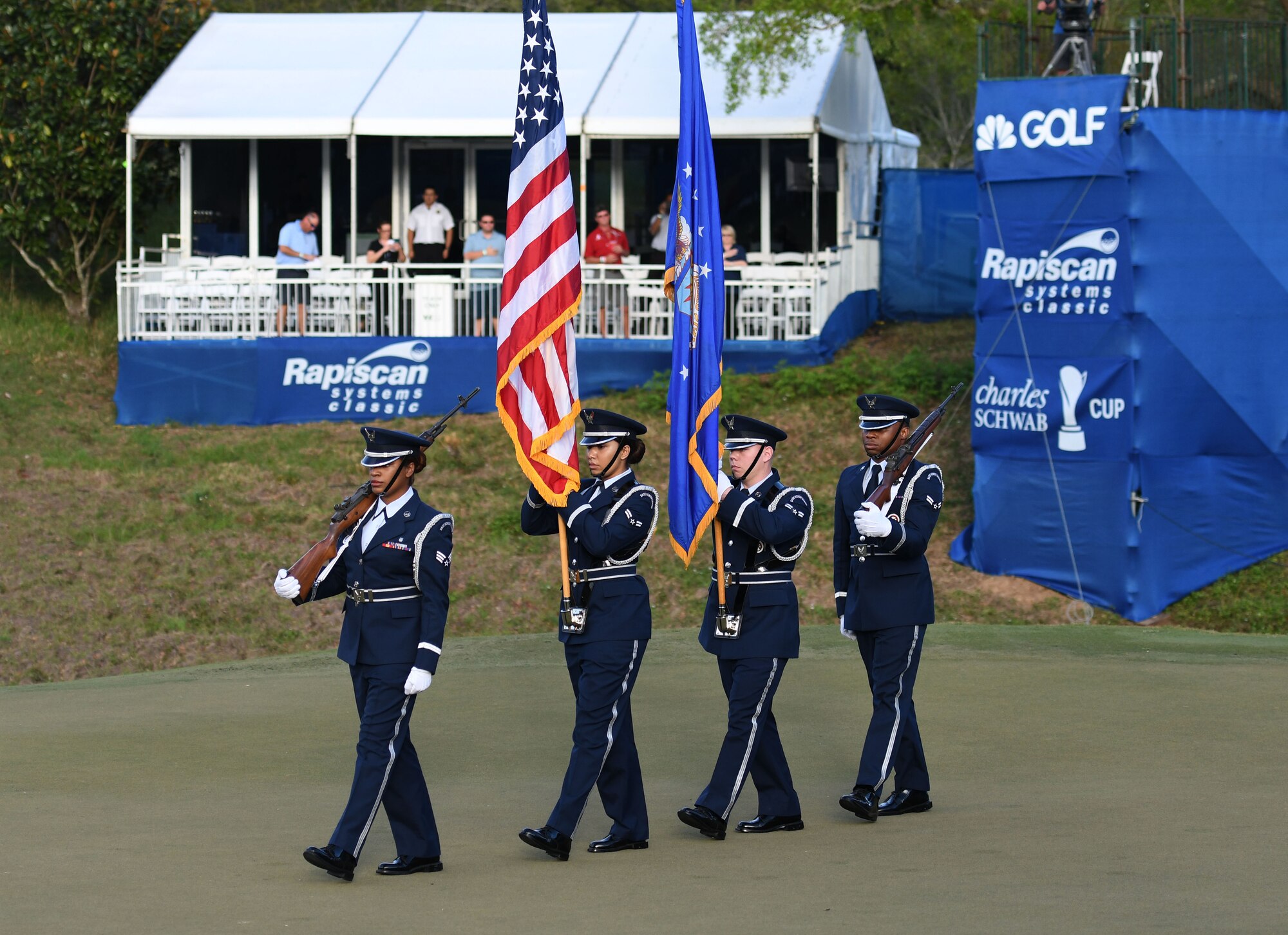 The Keesler Honor Guard presents the colors during the Rapiscan Systems Classic Champions Tour at Fallen Oak Golf Club March 25, 2018, in Saucier, Mississippi. Keesler personnel performed the national anthem and presented the colors during the closing ceremony of the three-day event. (U.S. Air Force photo by Kemberly Groue)