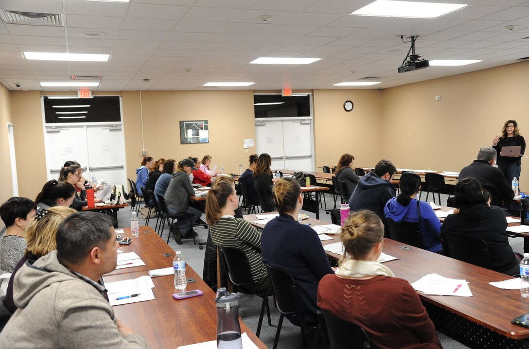 Participants of a Let’s Talk Malmstrom Spouse event listen as Stephanie Balkey, 341st Force Support Squadron human resources officer, discusses different personality types and how to use strengths to help build and grow relationships March 26, 2018, at Malmstrom Air Force Base, Mont. Let’s Talk is a monthly event geared toward providing professional and personal development, generating discussion on life and military issues, and an opportunity to share experiences and build relationships among spouses. (U.S. Air Force photo by Christy Mason)