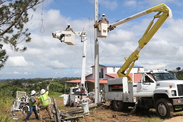 Despite the rugged terrain, power workers with the U.S. Army Corps of Engineers reconnect power lines near the town of Lares, Puerto Rico, Jan. 24, 2018. An estimated 80 percent of the power grid in Puerto Rico was destroyed by Hurricane Maria in September. Army photo by Preston Chasteen