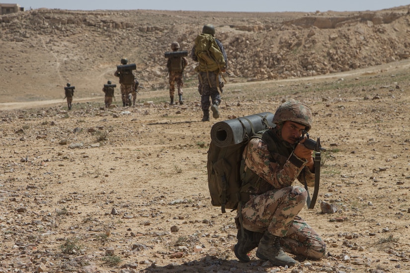 Jordanian service members conduct a simulated patrol as part of the culminating exercise of the Jordan Armed Forces Noncommissioned Officers Academy Squad Leader Course, March 21, 2018, near Amman, Jordan. U.S. advisors assisted in the development of the Jordanian-led course.