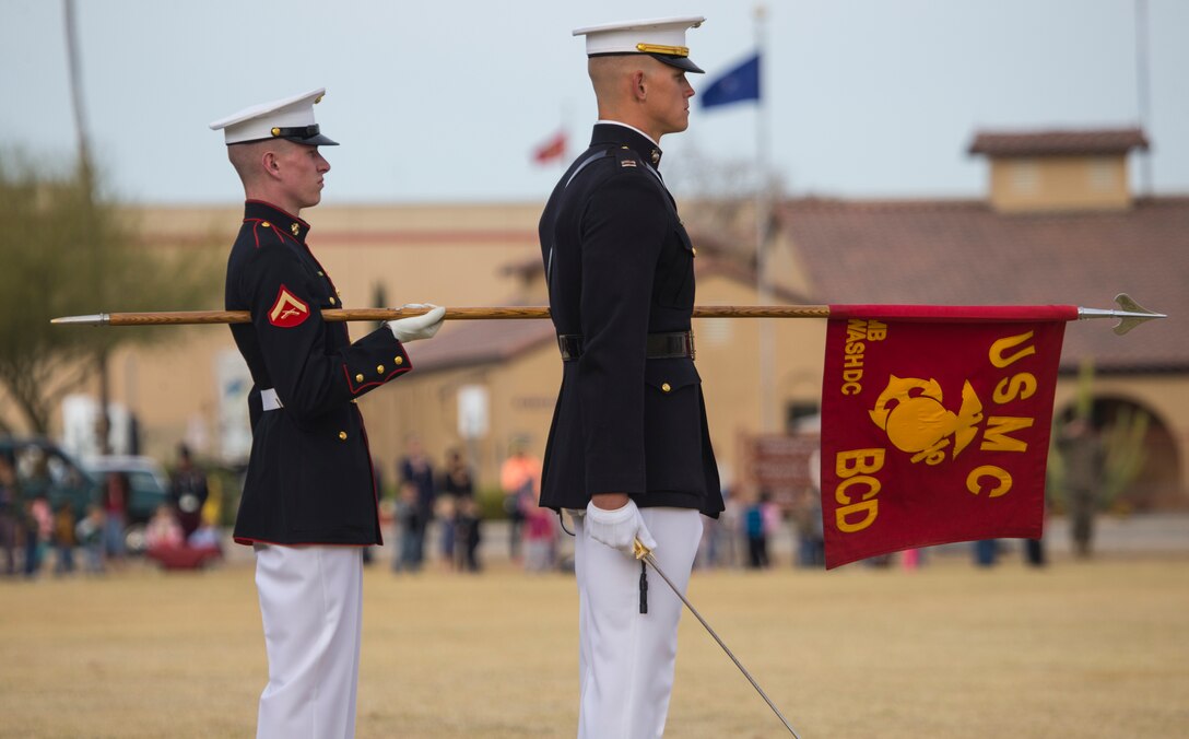 The U.S. Marine Corps Silent Drill Platoon, Marine Barracks Washington, D.C., perform during the Battle Color Ceremony at Marine Corps Air Station  Yuma, Ariz., March 7, 2018. The ceremony was held to celebrate Marine Corps history using music, marching, and silent precision drill. (Photos taken by Lance Cpl. Eric Shannon)