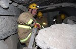 Soldiers with the 128th Air Wing, Montana Air National Guard, take out their extraction tools after rescuing “citizens” from a simulated rubble pile March 6 during joint exercise Vigilant Guard 2018 in Helena, Mont. For this exercise, the scenario that sparked the “emergency response” was a 7.5 magnitude earthquake that occurred near the Hebgen Dam in southern Montana, which led several buildings to collapse in various locations within the state.