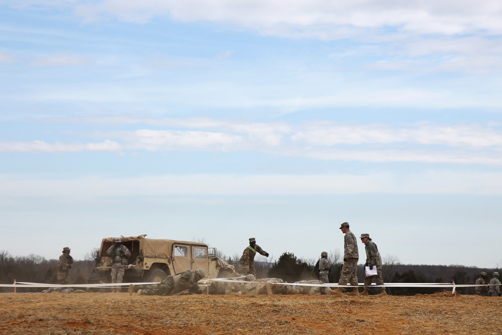 U.S. Army Reserve Soldiers conduct low crawling techniques in response to simulated direct fire, ahead of their lanes training validation, during Combat Support Training Exercise 78-18-03, at Fort Knox, Kentucky, Mar. 19, 2018.