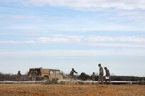 U.S. Army Reserve Soldiers conduct low crawling techniques in response to simulated direct fire, ahead of their lanes training validation, during Combat Support Training Exercise 78-18-03, at Fort Knox, Kentucky, Mar. 19, 2018.