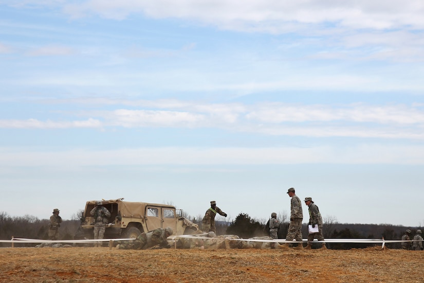 U.S. Army Reserve Soldiers conduct low crawling techniques in response to simulated direct fire, ahead of their lanes training validation, during Combat Support Training Exercise 78-18-03, at Fort Knox, Kentucky, Mar. 19, 2018.