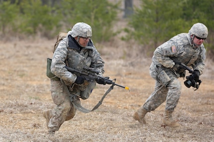 U.S. Army Reserve Soldiers, assigned to the 327th Quartermaster Battalion, based in Williamsport, Pennsylvania, conduct three-to-five second buddy rushes as part of their reacting to direct fire training, ahead of their lanes training validation, during Combat Support Training Exercise 78-18-03, at Fort Knox, Kentucky, Mar. 19, 2018.