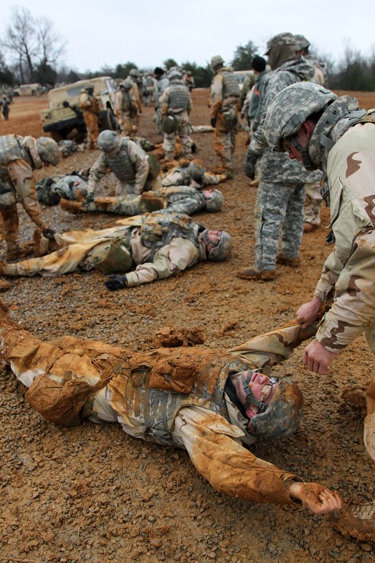 U.S. Army Reserve Soldiers, assigned to the 327th Quartermaster Battalion, based in Williamsport, Pennsylvania, conduct training on transporting a casualty as part of their skill level one tasks, ahead of their lanes training validation, during Combat Support Training Exercise 78-18-03, at Fort Knox, Kentucky, Mar. 20, 2018.