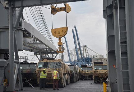 Vehicles assigned to the 82nd Airborne Division are loaded onto the USNS Watson (T-AKR-310) in preparation for transport at Joint Base Charleston’s - Weapons Station, S.C., March 20. The 841st Transportation Battalion, 597th Transportation Brigade, on-loaded more than 1,500 vehicles and equipment, including combat helicopters. Charleston has the capability to transport cargo by air, land, rail and sea.