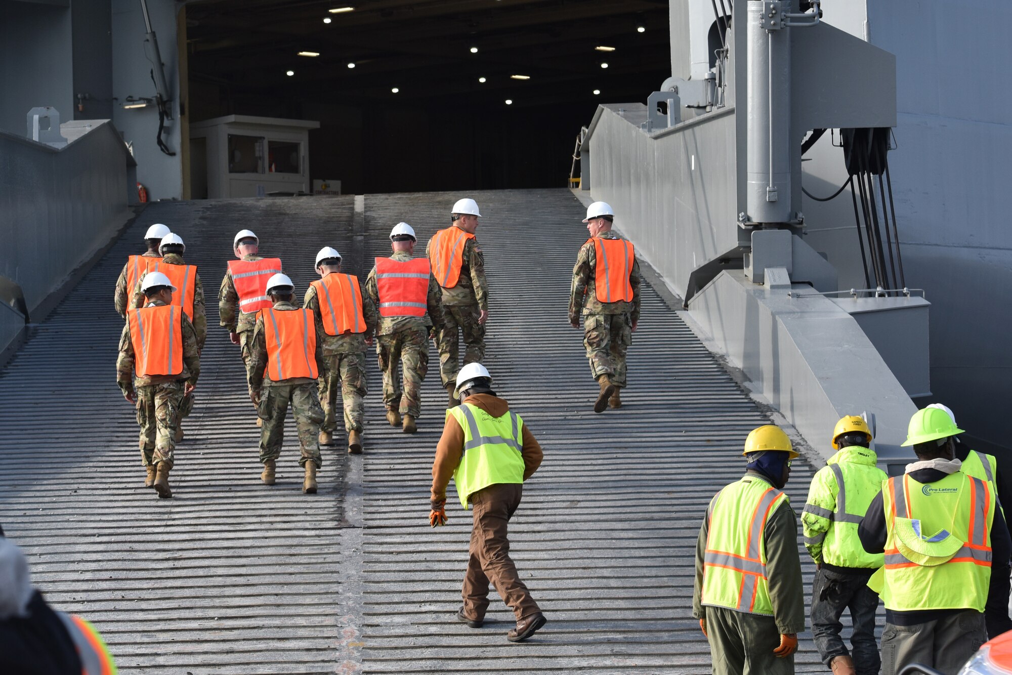 U.S. Army Soldiers board the USNS Watson (T-AKR-310) prior to on-loading vehicles assigned to the 82nd Airborne Division at Joint Base Charleston’s - Weapons Station, S.C., March 20. The 841st Transportation Battalion, 597th Transportation Brigade, on-loaded more than 1,500 vehicles and equipment, including combat helicopters. Charleston has the capability to transport cargo by air, land, rail and sea.