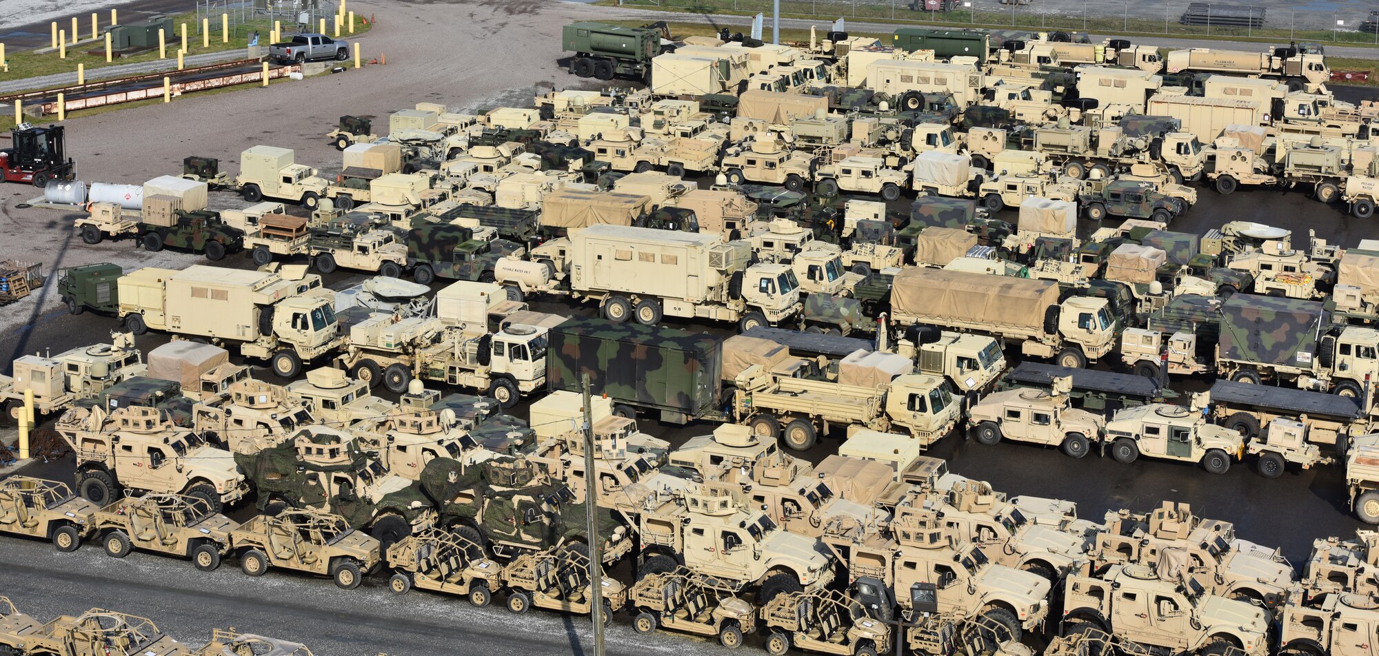 Vehicles assigned to the 82nd Airborne Division are loaded onto the USNS Watson (T-AKR-310) in preparation for transport at Joint Base Charleston’s Naval Weapons Station March 20, in South Carolina. The 841st Transportation Battalion, 597th Transportation Brigade, on-loaded more than 1,500 vehicles and equipment, including combat helicopters, in support of the movement. Joint Base Charleston has the capability to transport cargo by air, land, rail and sea.