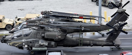 U.S. Army helicopters assigned to the 82nd Airborne Division are placed alongside the USNS Watson (T-AKR-310) prior to being on-loaded at Joint Base Charleston’s - Weapons Station, S.C., March 20. The 841st Transportation Battalion, 597th Transportation Brigade, on-loaded more than 1,500 vehicles and equipment, including combat helicopters. Charleston has the capability to transport cargo by air, land, rail and sea.
