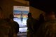 Members of the 332nd Air Expeditionary Wing gather around the T-wall of Staff Sgt. Alexandria Morrow at an undisclosed location in Southwest Asia at 12:21 a.m. March 22, 2018.  She passed away during a bomb loading accident March 22, 2017. Her co-workers called her the “Mom of the flight line” because of how she took care of everyone. Members played Taps held a moment of silence performed a flag folding ceremony. The flag along with pictures of the ceremony will be sent to Morrow’s family. (U.S. Air Force photo by Senior Master Sgt. Cohen A. Young)