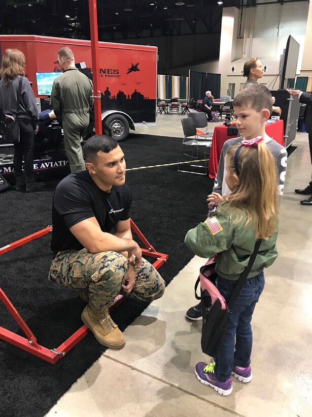 Marines with the 12th Marine Corps District supported the Women in Aviation International Symposium in Reno, Nev., March 22 – 24, 2018, by educating the public on air capabilities and opportunities within the Marine Corps. The event brought together aviators from around the world and celebrated the 100th anniversary of women serving in the Marine Corps. (Courtesy photo by Capt. Maureen Krebs.)