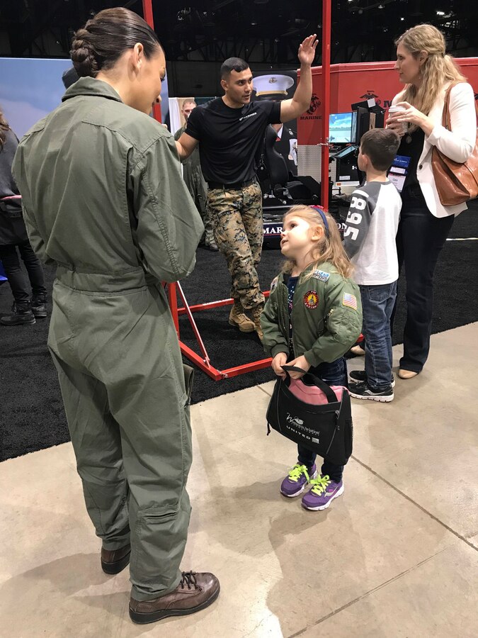 Marines with the 12th Marine Corps District supported the Women in Aviation International Symposium in Reno, Nev., March 22 – 24, 2018, by educating the public on air capabilities and opportunities within the Marine Corps. The event brought together aviators from around the world and celebrated the 100th anniversary of women serving in the Marine Corps. (Courtesy photo by Capt. Maureen Krebs.)