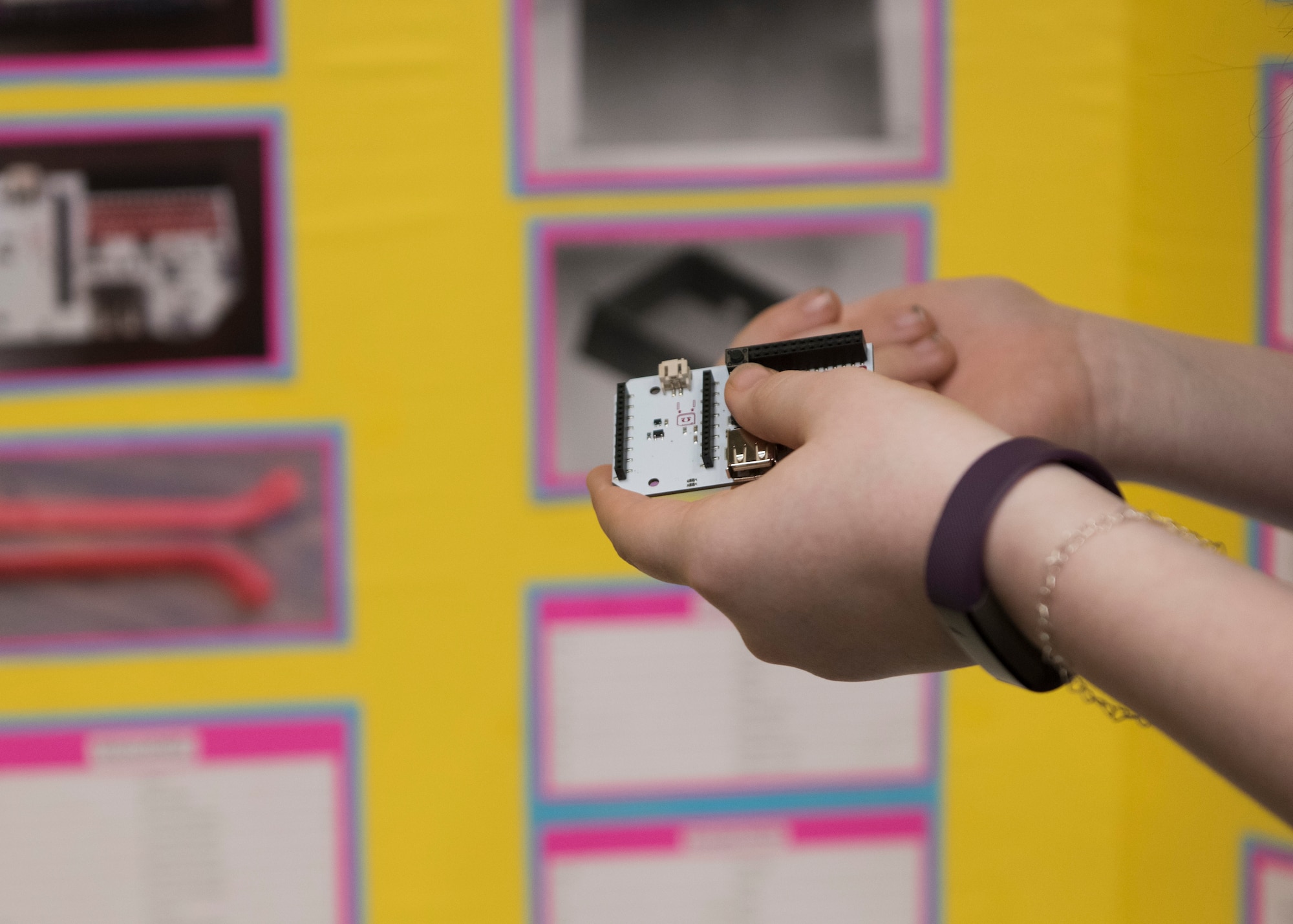 Alexis Ross, Spokane Valley Tech student, displays her "bullying prevention bracelet" project during the Eastern Washington Regional Science and Engineering Fair at the Spokane Washington State University campus, Washington, March 15, 2018. Sixth through 12th grade students from schools around the region gathered to showcase their science, technology, engineering and math projects at the fair. (U.S. Air Force photo/Senior Airman Ryan Lackey)