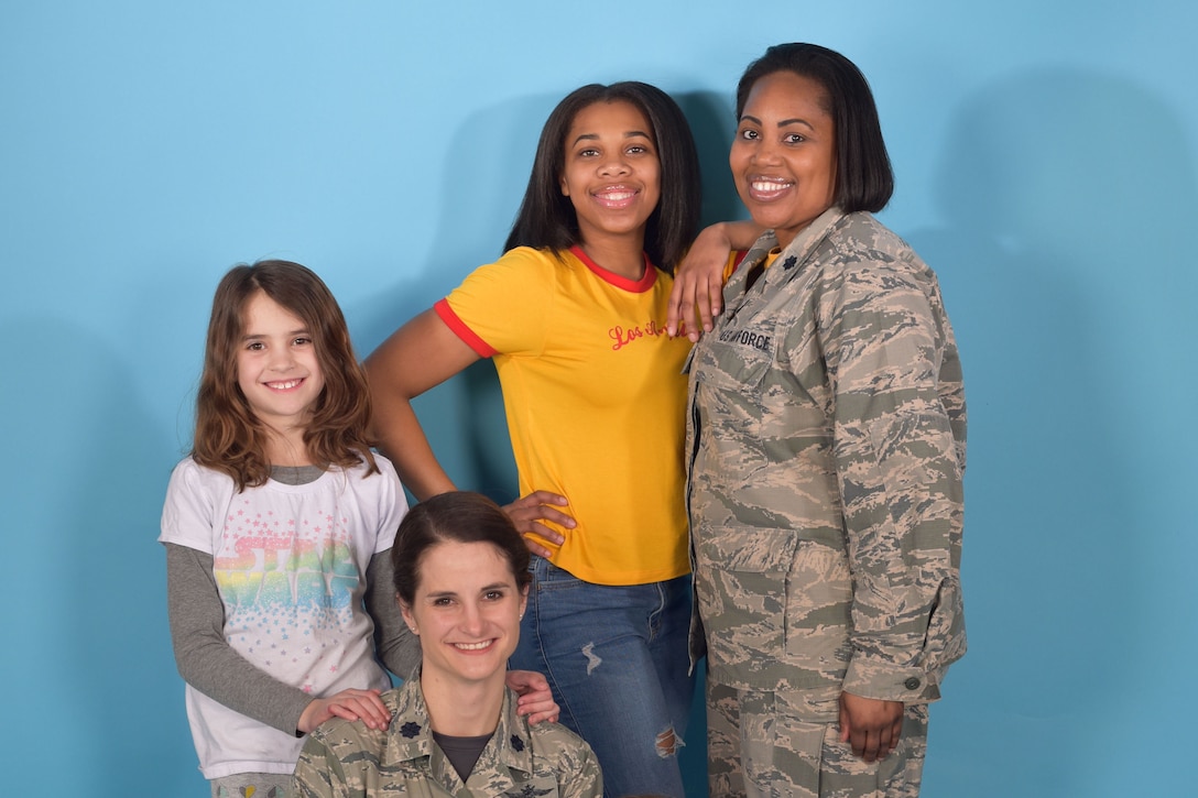 Female Air Force leaders pose with their children.