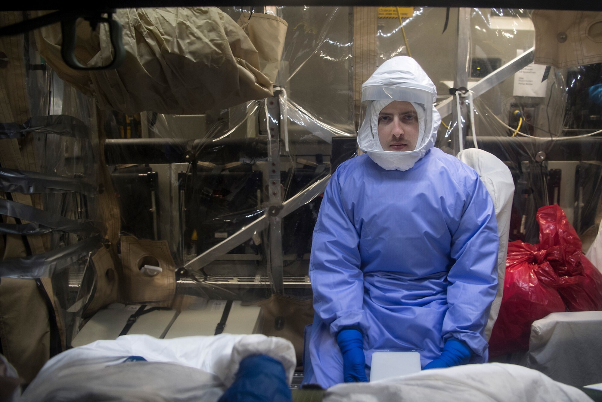 Tech. Sgt. Gregory Izzi, 43rd Aeromedical Evacuation Squadron medical technician, is one of several Airmen from Air Mobility Command bases to come to Joint Base Charleston, S.C. for a transportable isolation system training event, March, 14, 2018.